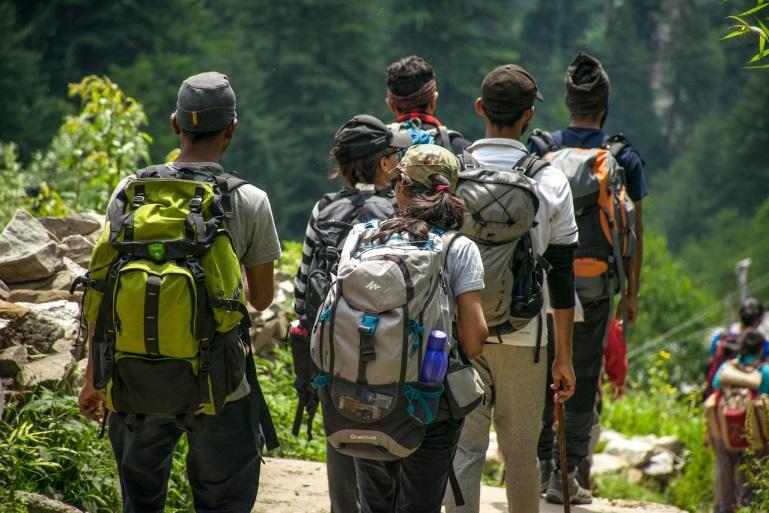 group of hikers walking along a trail