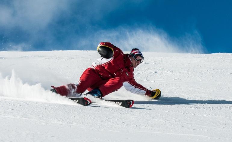 man skiing downhill