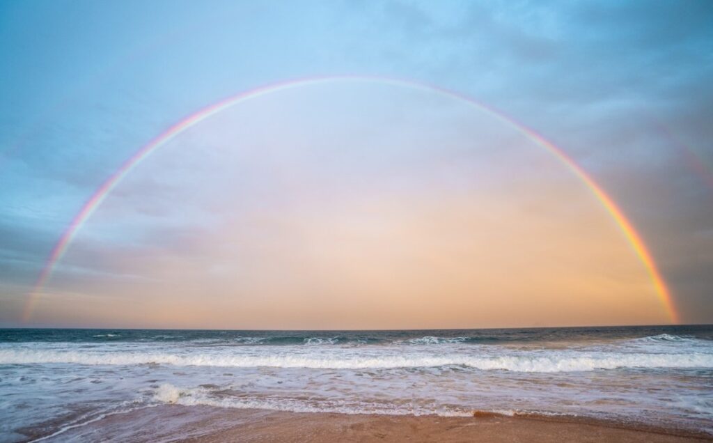 rainbow on the sea horizon