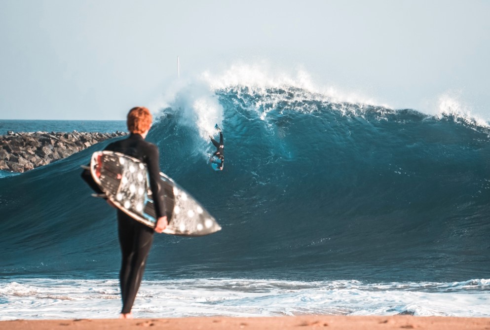 surfers in newport beach