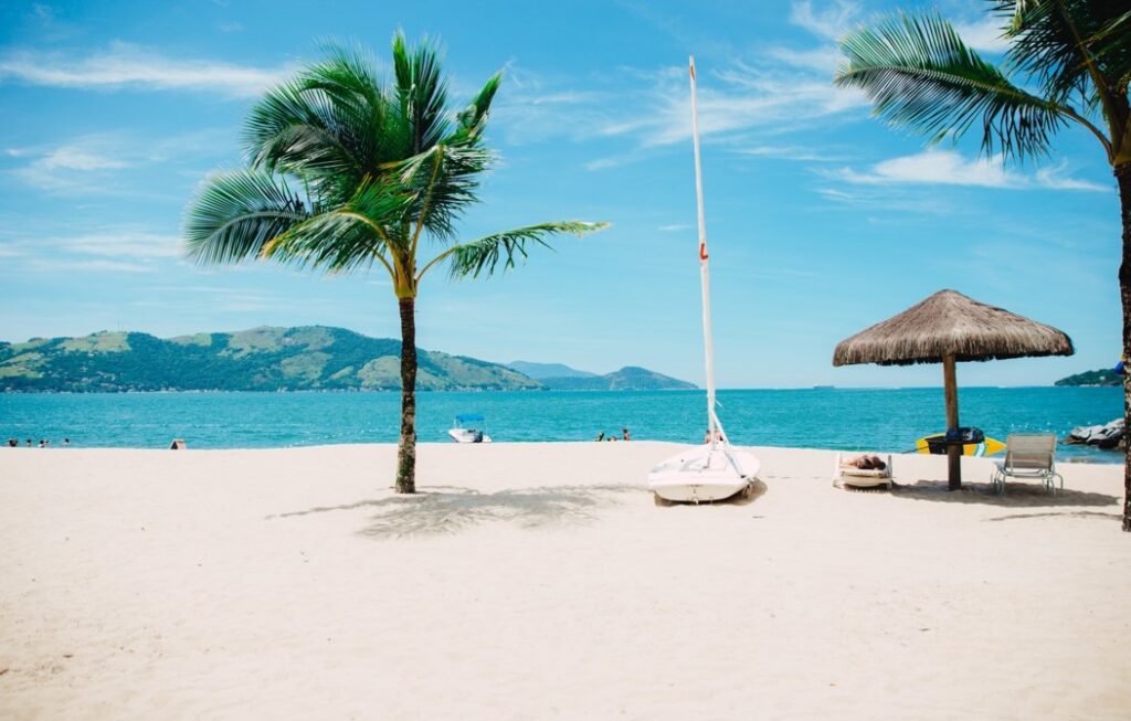 white sandy beach overlooking the ocean