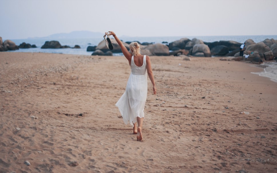 woman walking on the beach