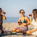 women having a picnic on the beach